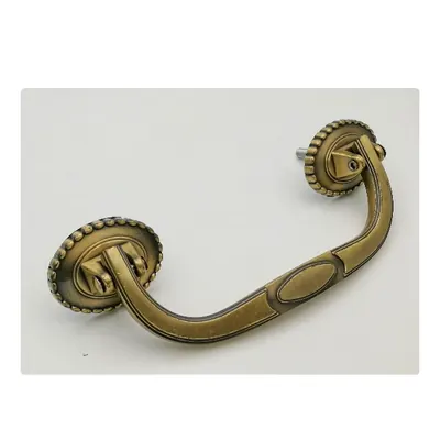 Movable bar coffin handle 1030 in antique brass color and good polish side view